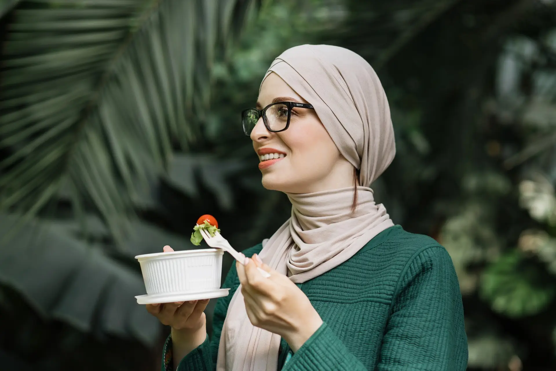 Arab girl eating healthy meal.